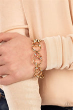 Load image into Gallery viewer, The Universe Revolves Around Me Gold Bracelet - Paparazzi Accessories
