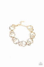 Load image into Gallery viewer, The Universe Revolves Around Me Gold Bracelet - Paparazzi Accessories
