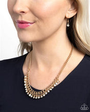 Load image into Gallery viewer, Glow and Grind Gold Necklace - Paparazzi Accessories
