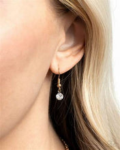 Load image into Gallery viewer, Glow and Grind Gold Necklace - Paparazzi Accessories

