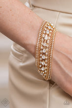 Load image into Gallery viewer, Interstellar Interlude Gold Bracelet - Paparazzi Accessories
